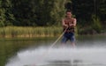 Man wakeboarder on pond in park Royalty Free Stock Photo