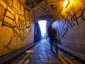 Man walking in an alley of white chapel district Royalty Free Stock Photo