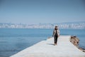 man walking alone in empty dock in the sea of marmara Royalty Free Stock Photo