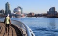 Man walking along the riverside