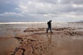 Man walking along Scarborough beach