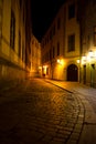 Man walking around the street of the old town at night in Pragu Royalty Free Stock Photo