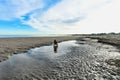 man walking on beach, photo as a background , in sottomarina, venice, italy Royalty Free Stock Photo
