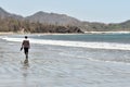 man walking on the beach, photo as a background taken in Nicoya, Costa rica central america