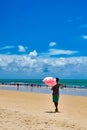 man walking on the beach and selling cotton candy Royalty Free Stock Photo