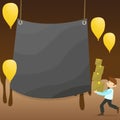Man Walking Carrying Pile of Boxes and Scattered Yellow Balloons. Blank Color Tarpaulin Hanging in the Center. Creative Royalty Free Stock Photo