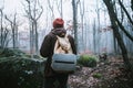 Man walking on a dark path through a spooky forest Royalty Free Stock Photo