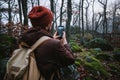 Man walking on a dark path through a spooky forest Royalty Free Stock Photo