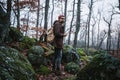 Man walking on a dark path through a spooky forest Royalty Free Stock Photo