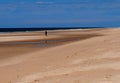 Man Walking On Beach At Praia Do Barril Tavira Portugal