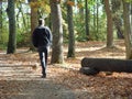 Man walking dog Royalty Free Stock Photo