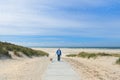 Man with dog in landscape beach Royalty Free Stock Photo