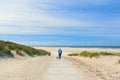 Man with dog in landscape beach Royalty Free Stock Photo