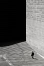 A man walking down stairs in front of a building, AI Royalty Free Stock Photo