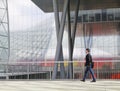 Man walking in Fieramilano, Milan Exhibition center, Italy