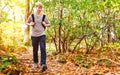 Man walking on a forest path Royalty Free Stock Photo