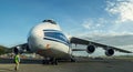 Man , walking in front of airplane An-124-100 (Russia's largest cargo plane in the world)