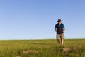 Man Walking Grass Field