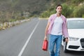Man walking and holding petrolcan Royalty Free Stock Photo