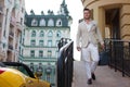 Man walking after luxury shopping