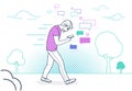 Man walking outdoors in park and using smartphone to send sms and messages in social networks Royalty Free Stock Photo