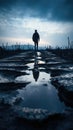 A man walking on a road with puddles in the middle. Generative AI image