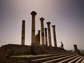 A man walking in the Roman ruins of Volubilis.