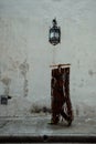 man walking with a set of hanging doorway bead curtain at the heart of the historical city Royalty Free Stock Photo