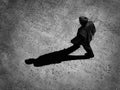Man Walking Shadow Representing Progress and Achievement Royalty Free Stock Photo