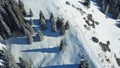 A man is walking on a snowy slope. Royalty Free Stock Photo