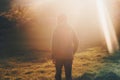 Man walking at sunset light forest Travel Lifestyle Royalty Free Stock Photo