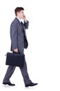 Man walking and talking on phone Royalty Free Stock Photo