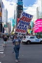 Man in Times Square with a Religious Sign Proclaiming the End is Near in New York City Royalty Free Stock Photo