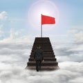 Man walking toward red wavy flag on top of stairs