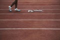 Man walking towards starting block. Conceptual image shot