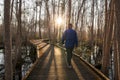 Man walking trail in early morning Royalty Free Stock Photo