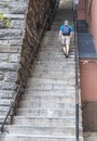 Man Walking Up a Flight of Stairs