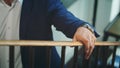 A Man Walking Up the Stairs Holding the Bannister Royalty Free Stock Photo