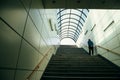 Man walking up subway exit stairs in Korea Royalty Free Stock Photo