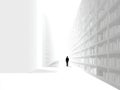 Man Walking in Vast White Library of Knowledge Royalty Free Stock Photo