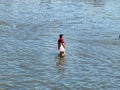 Man walking through the water Royalty Free Stock Photo