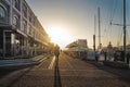 Man walking on waterfront harbor cape town with sunset Royalty Free Stock Photo