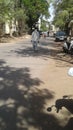 A man walking by wearing mask on mouth