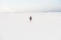 Man walking at White Sands National Monument in Alamogordo, New Mexico. Royalty Free Stock Photo