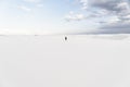 Man walking at White Sands National Monument in Alamogordo, New Mexico.