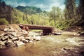 Man walking through a wooden bridge Royalty Free Stock Photo