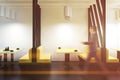 Man walking in a yellow sofas diner interior Royalty Free Stock Photo