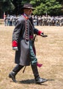 Man walks in Confederate officer uniform