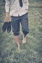 Man walks on grass Royalty Free Stock Photo
