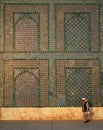 A man walks past the Blue Mosque in Mazar i Sharif, Afghanistan